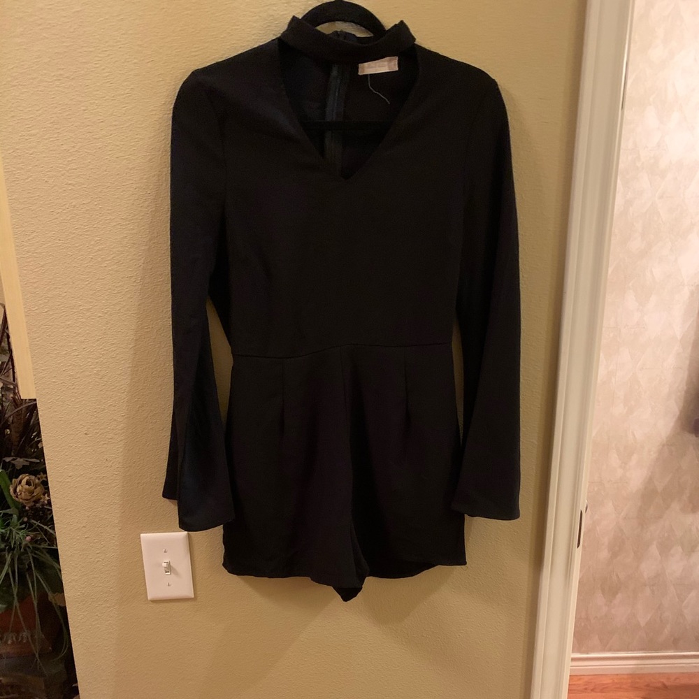 All black flare sleeve romper